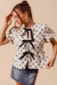 Contrast Bow Textured Peplum Top - IVORY