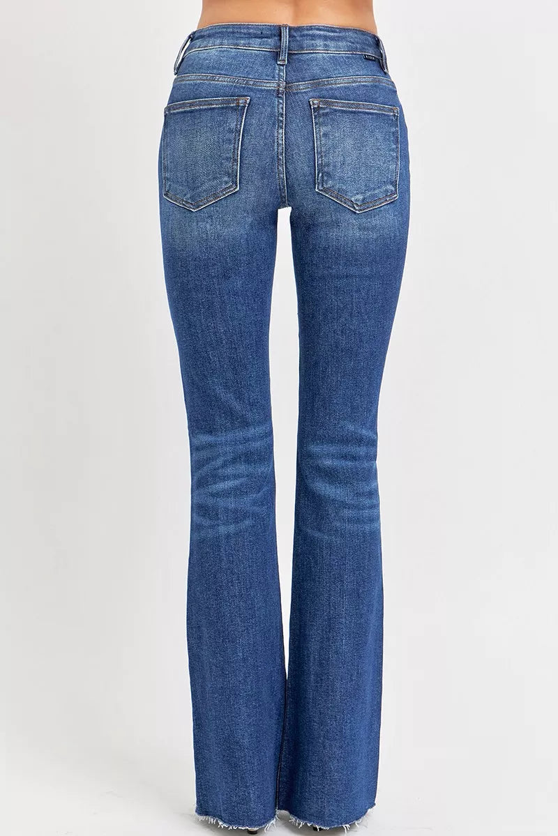 Distressed Mid Rise Flare Leg Jeans -