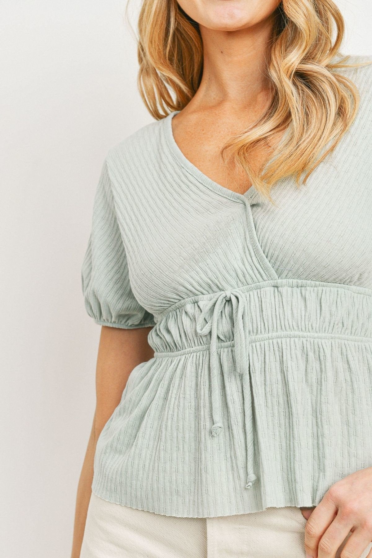 Ribbed Front Tie Peplum Blouse -