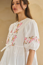 Embroidered Bow Peplum Blouse -