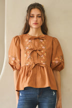 Embroidered Bow Peplum Blouse - Chesnutt