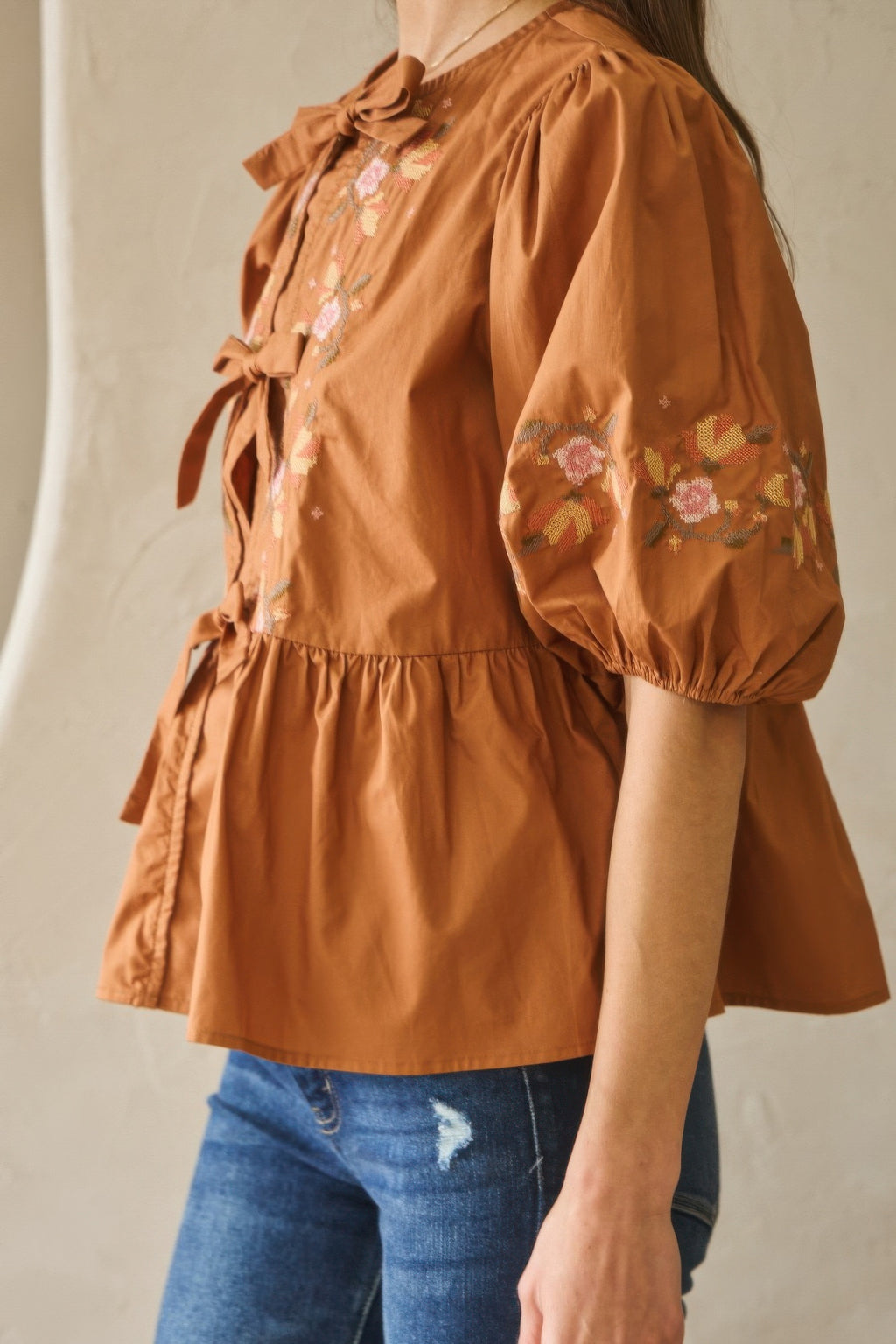 Embroidered Bow Peplum Blouse -