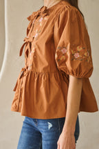 Embroidered Bow Peplum Blouse -