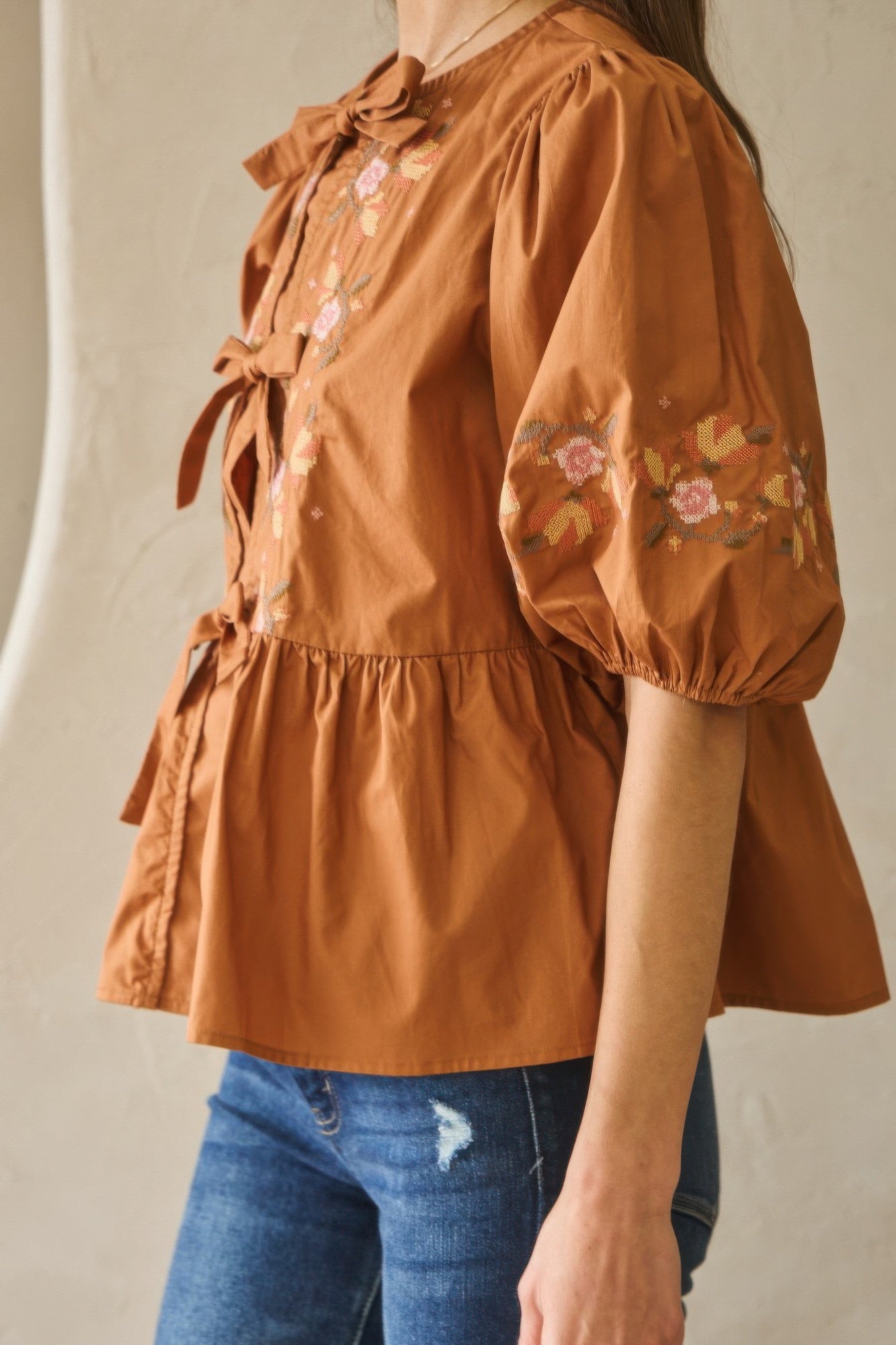 Embroidered Bow Peplum Blouse -