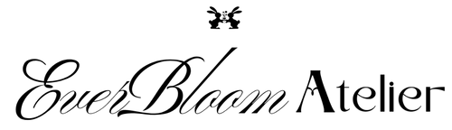 Logo of EverBloom Atelier with two bunnies icon on a white background