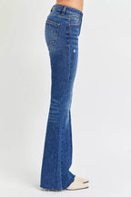 Distressed Mid Rise Flare Leg Jeans -