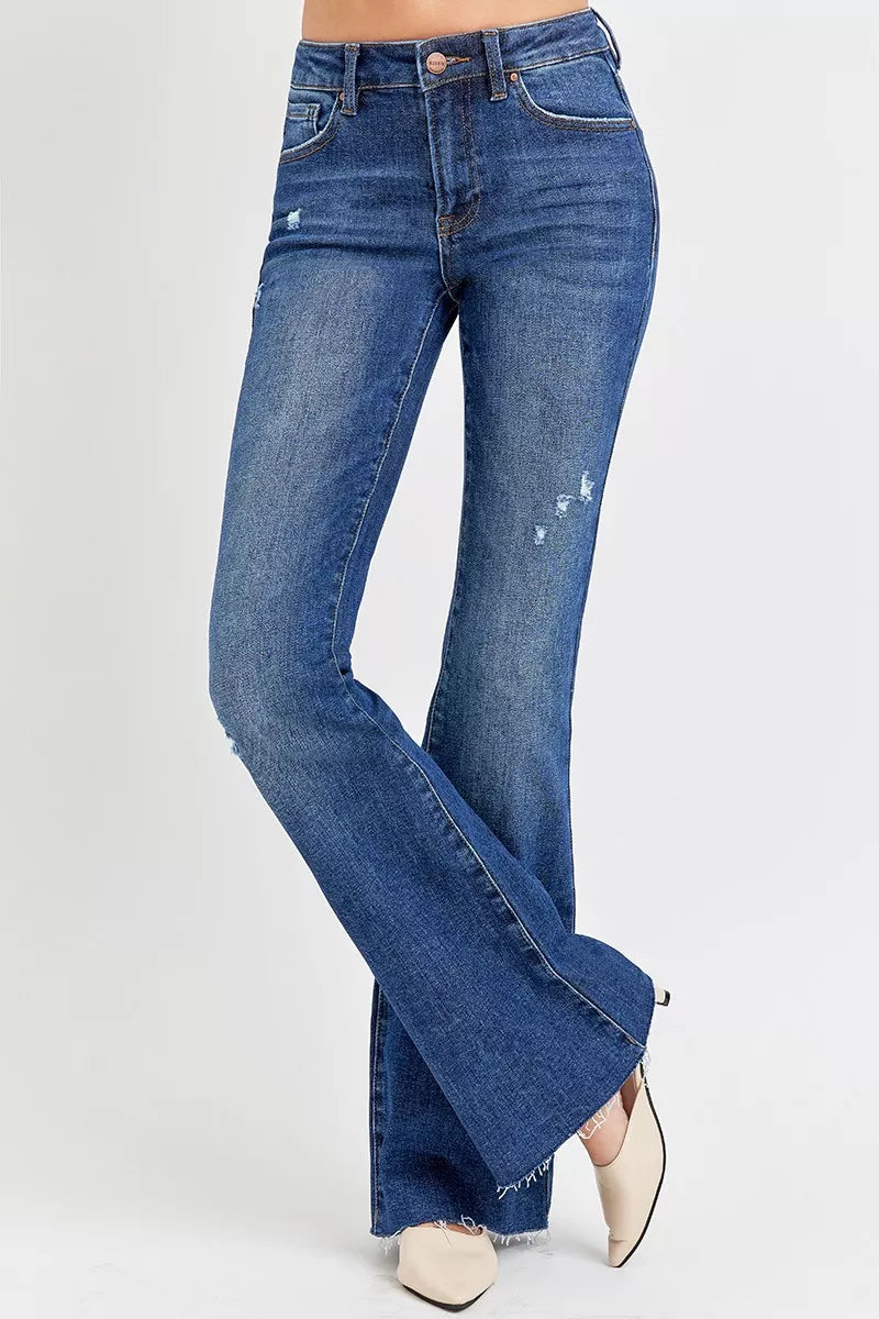 Distressed Mid Rise Flare Leg Jeans -